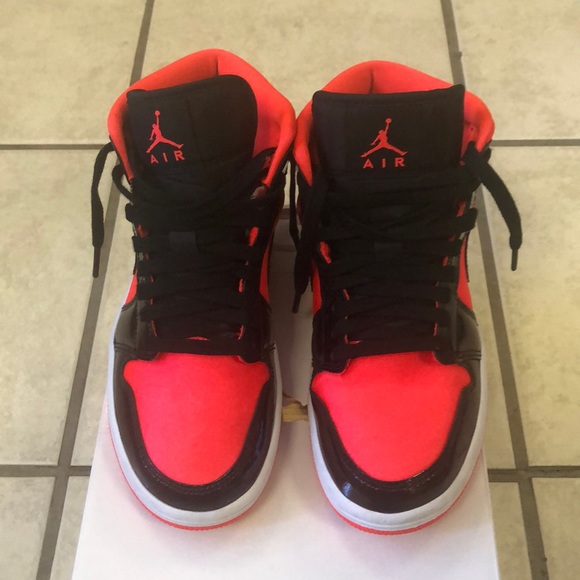 bright crimson black jordan 1